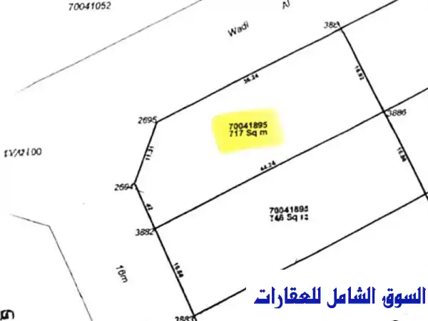 فرصة استثنائية بالعب: أرض زاوية 717م² على شارعين -...