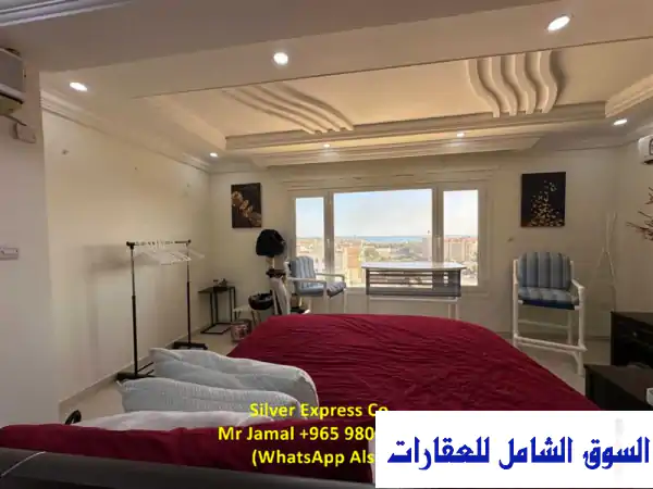 استوديو مفروش فاخر على السطح بإطلالة بحرية...