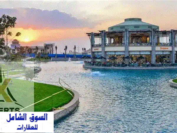 فرصة استثمارية ذهبية: محل تجاري 100م ناصية بمدينتي أوبن اير مول القديم | عالبحيرات وبجوار CIB | عقد قديم وإيجار مضمون من طلعت مصطفى