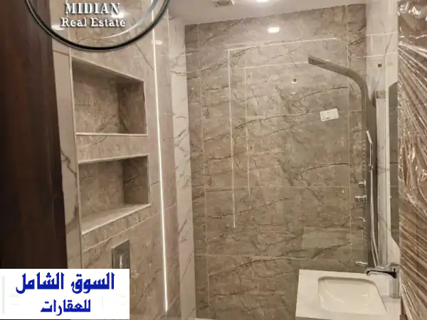 فرصتك الذهبية: شقة شبه أرضي جديدة للبيع في ضاحية الرشيد 125م سوبر ديلوكس - استثمار وسكن فاخر!