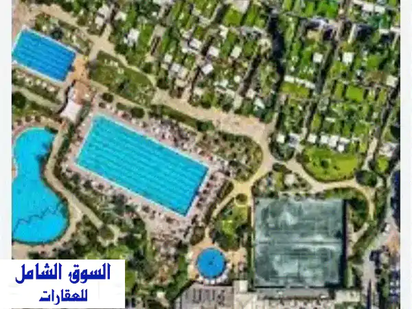 فرصة ذهبية! شاليه سوبر ديلوكس للبيع في هوليدي بيتش | مفروش بالكامل | استمتع بالرفاهية!