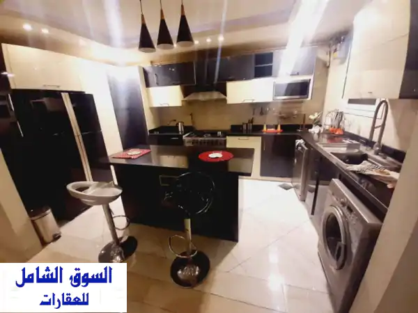 شقة فندقية فاخرة للإيجار اليومي والشهري بالمهندسين: 3 غرف أمام بوابة نادي الزمالك | إنترنت مجاني وراحة استثنائية