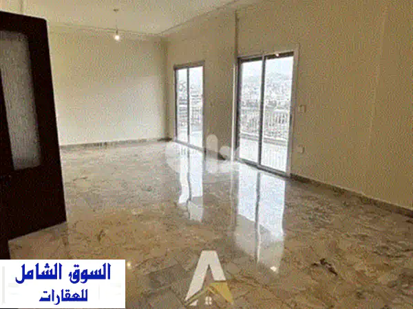 شقة فاخرة للبيع بالمنصورية (240م²) | مفروشة بالكامل بإطلالة بحر ومدينة بانورامية!