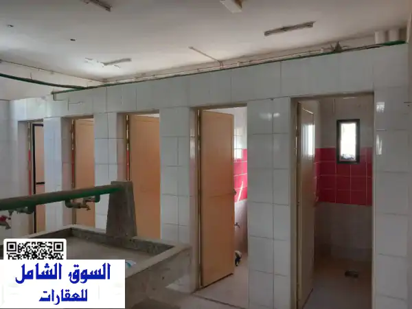 للبيع: مجمع محلات وسكن عمال متكامل 25000 قدم² في صناعية عجمان | فرصة استثمارية بعائد مرتفع مضمون