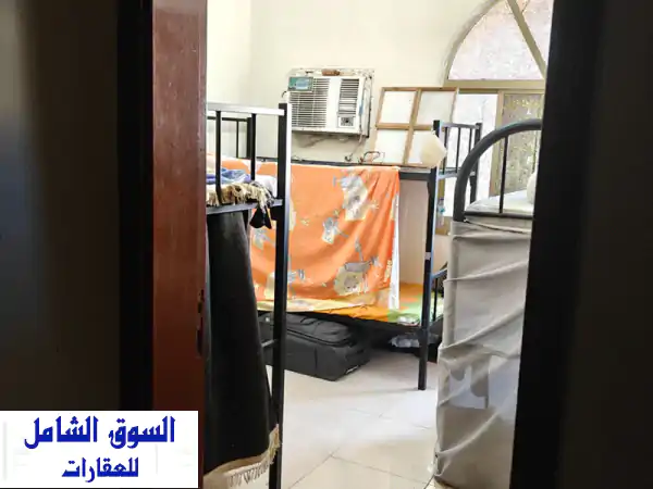 الشارقة مويلح التجاريه متوفر غرفة تصلح لعمال بدون مطبخ