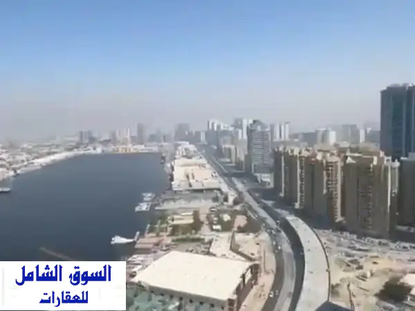 للبيع عجمان: شقة 3 غرف وصالة مفروشة بأبراج الواحة 1 | سكن واستثمار ذكي