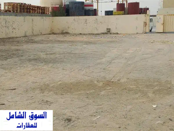 فرصة ذهبية: أرض صناعية مسورة للإيجار في الصجعة (S) الشارقة | 10000 قدم مربع بمكتب وغرفة | موقع استراتيجي