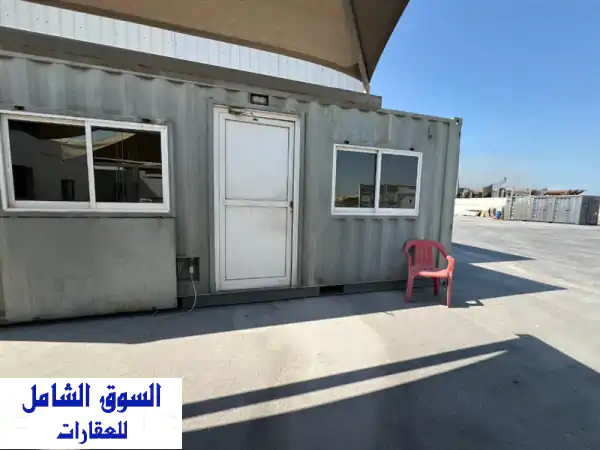 فرصة استثنائية: أرض بمستودع ومكاتب للإيجار بالسلمانية | موقع صناعي ولوجستي استراتيجي