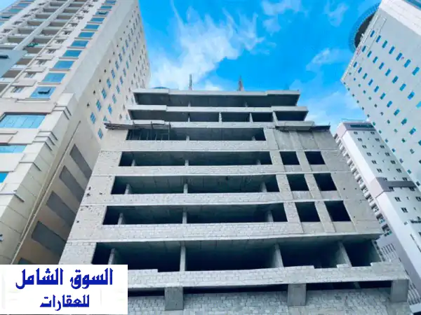 فرصة استثمارية ذهبية: برج (هيكل خرساني) للبيع بالنهضة الشارقة - موقع استراتيجي لا يُعوّض!