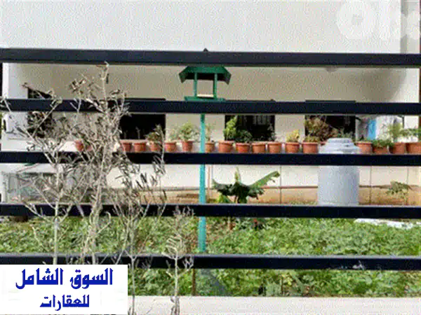 شقة فاخرة للبيع في عين الرمانة 130م² | شبه مفروشة | إطلالة مفتوحة وموقع استراتيجي