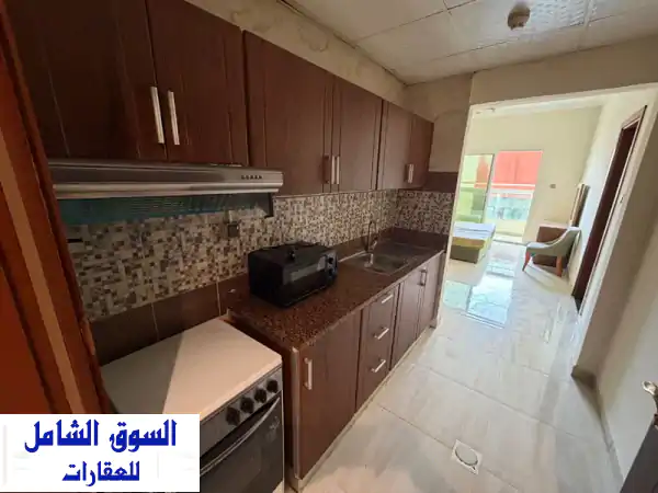 استوديو الأحلام للإيجار السنوي في عجمان - الجرف 2 | مفروش، بلكونة، صيانة مجانية ودفعات ميسرة