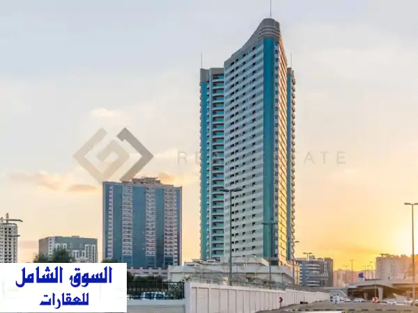 شقة فاخرة للبيع في برج الكونكر الراشدية عجمان - 3 غرف وصالة بإطلالة بانورامية وجاهزة للسكن!