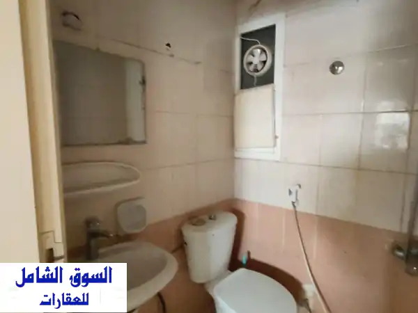 استوديو راقٍ للإيجار في البوطينة، الشارقة | مطبخ منفصل ومساحة عملية | 18000 درهم سنويًا