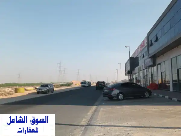 فرصة العمر! أرض تجارية 77 ألف قدم على شارع...