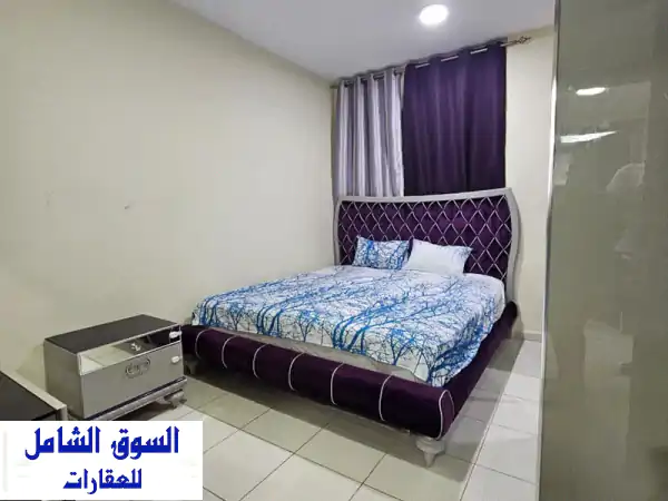 فرصتك الذهبية: إيجار غرفة وصالة واسعة ببرج أكوا...