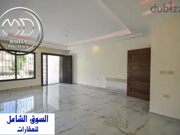 شقة أرضية فاخرة للبيع في الرابية 200م | حديقة وتراس 200م...