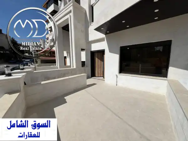 شقة أرضية جديدة فاخرة للبيع بتلاع العلي: 160م مع تراس...