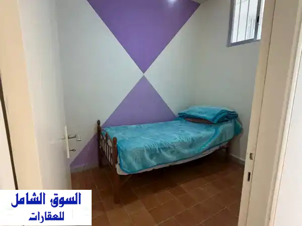 شاليه الأحلام للبيع في عنايا ☀️ 70م مفروش بالكامل بإطلالة بانورامية | GMB192 SZ