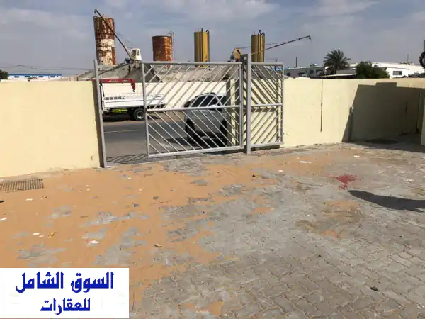 فرصة استثمارية مذهلة! حوطة للإيجار بالصناعية 15: 16000 قدم² على شارع عام مباشر | مكاتب، كهرباء 51KW