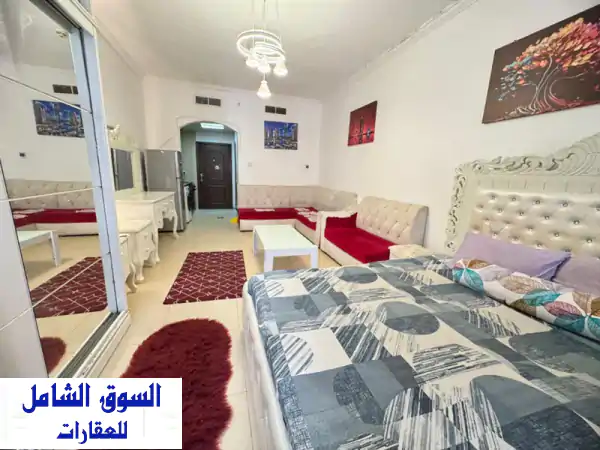 استوديو مفروش للإيجار الشهري بأبراج الياسمين عجمان | شامل الفواتير والإنترنت وموقف خاص 🚗
