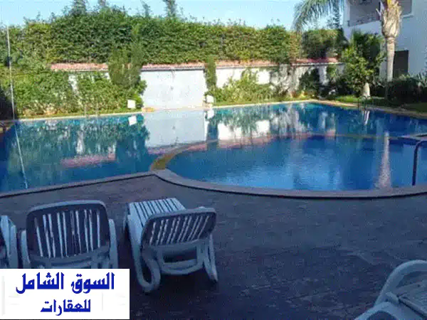 شقة الأحلام بصخيرات: أرضي 52م، إقامة محروسة، قرب البحر...