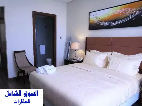 شقة فاخرة للإيجار في بنيد القار: غرفة نوم بإطلالة بحرية ساحرة، مفروشة بالكامل وخدمات فندقية!