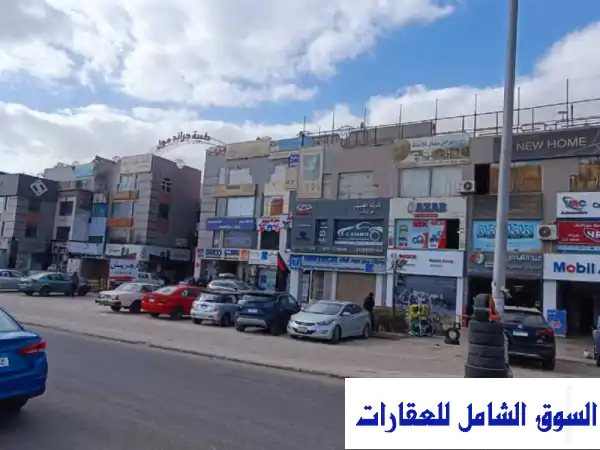 فرصة ذهبية: محل 85م (صيدلية) للإيجار على المحور المركزي 6 أكتوبر - مول شبانة | موقع استراتيجي