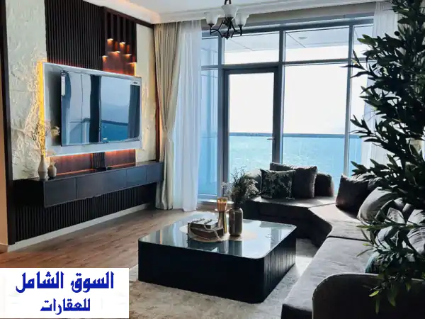شقة غرفتين وصالة بتشطيب فندقي واطلالة بحرية بالكامل شامل الفرش تملك حر لجميع الجنسيات خدمات متكاملة ...