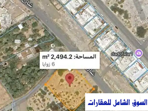 استثمار ذهبي في صحار! أرض سكنية تجارية بموقع استراتيجي للبيع | الباطنة، عمان | مساحة 2494.2م²