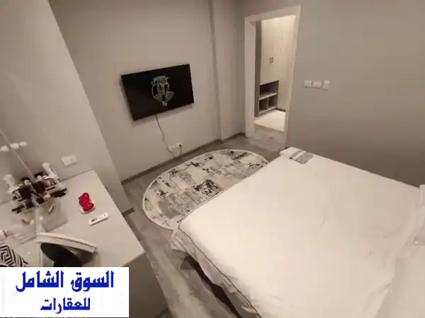 شقة مفروشة فاخرة للإيجار بالمهندسين | يومي وشهري | غرفتين 2 حمام | واي فاي مجاني