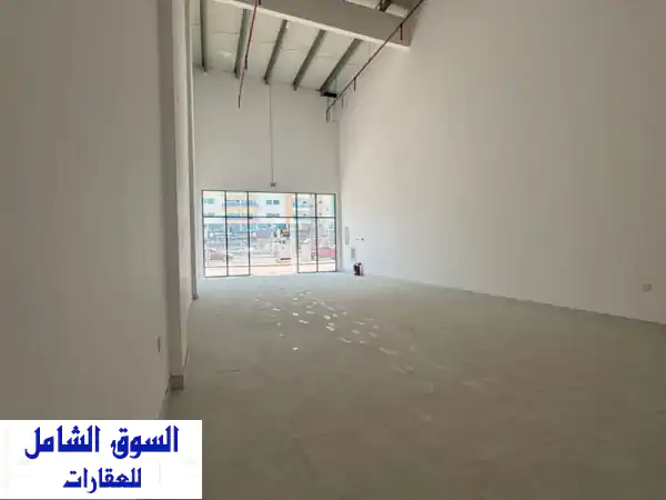 فرصة استثمارية ذهبية: محل ميزانين فاخر للإيجار السنوي بالراشدية 2 عجمان - موقع استراتيجي على شارع الشيخ خليفة مباشرةً