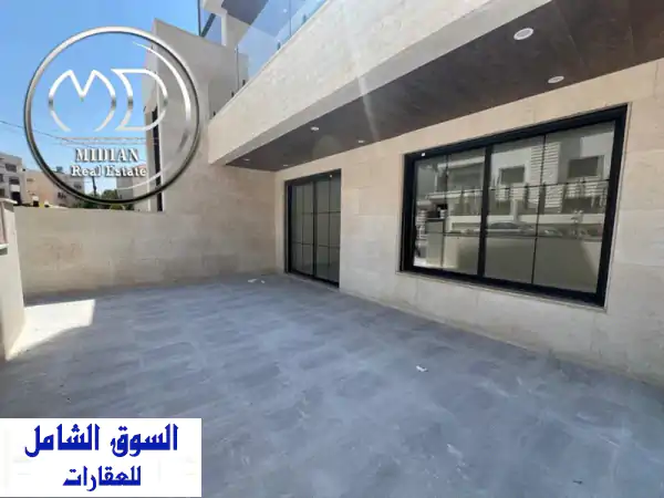 شقة أرضية جديدة وفخمة للبيع في خلدا 185م مع حديقة...