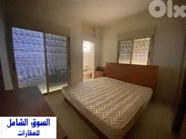 شقة فاخرة للبيع في حالات لبنان: إطلالة بحرية ساحرة، تراس 50م² وحديقة 70م² | جولدن مارك العقارية