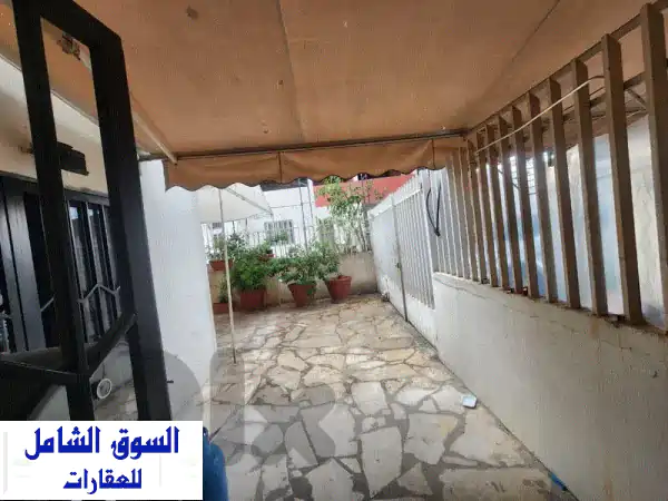 شقة فسيحة للإيجار في بيت الشعار (عوكر) | طابق أرضي...