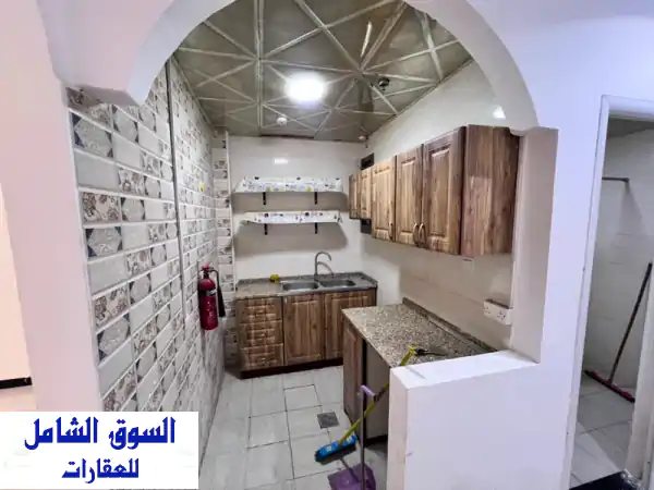 استوديو للإيجار السنوي بالروضة 3 عجمان | فرصة سكن مثالية بمطبخ منفصل وصيانة مجانية