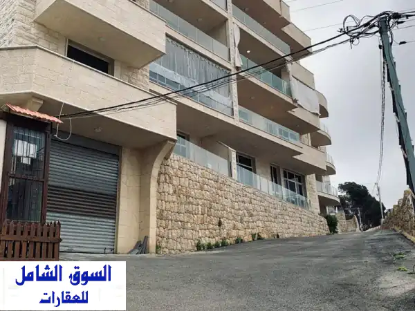 شقة للبيع في عيناب، منطقة راقية، 146 متر مربع، حجر صخري، غرفتين نوم، كل غرفة حمام مستقل، وحمام ضيوف ...