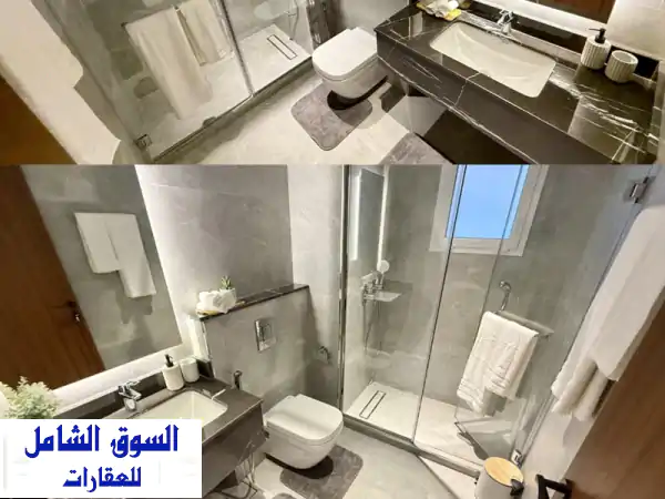 شقق فندقية جديدة مفروشة فاخرة للإيجار بالجفير | غرفتا نوم ماستر | برج مميز بشارع المطاعم