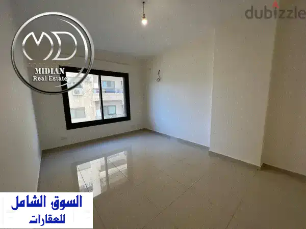شقة دوبلكس ارضية جديدة للبيع دير غبار مساحة 385 م مع ترس و حديقة 150 م ت