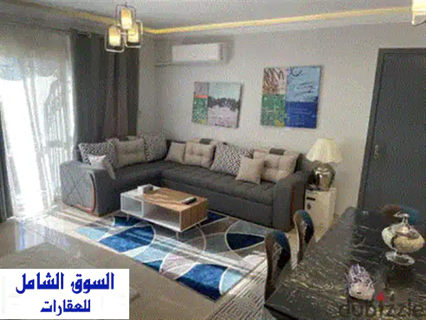 فرصة استثنائية للايجار بمدينتي: شقة 107م أرضي بحديقة 50م - تشطيب فندقي فاخر B6