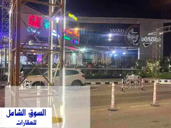 فرصة استثمارية ذهبية! محل تجاري 116م أمام الجامعة الأمريكية بـ Point 90 | تقسيط 7 سنوات ومقدم 10% | استثمر في قلب التجمع الخامس