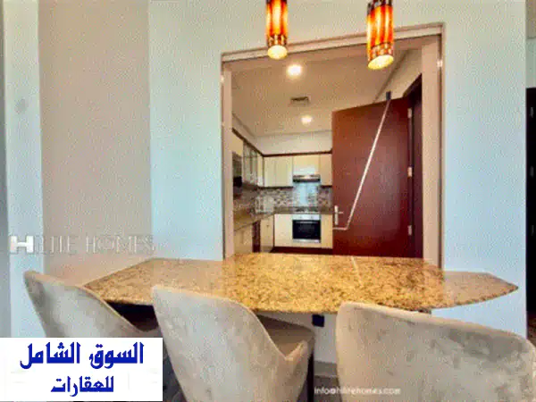شقة أحلامك ببنيد القار: مفروشة بالكامل، غرفتي نوم، خدمات فندقية راقية قرب الكويت | إيجار 800 د.ك