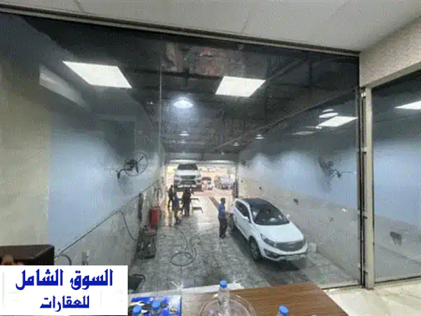 فرصة استثمارية ذهبية: مغسلة سيارات وتغيير زيوت للبيع بالكامل في الراشدية 1 عجمان - مشروع جاهز للتشغيل والربح!