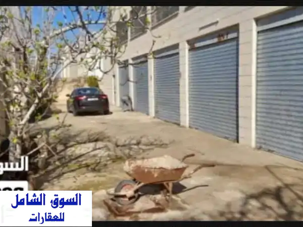 فرصة ذهبية: مجمع مخازن صناعية متكامل للإيجار السنوي بأبو علندا | 825م² ترخيص صناعي وموقع استراتيجي