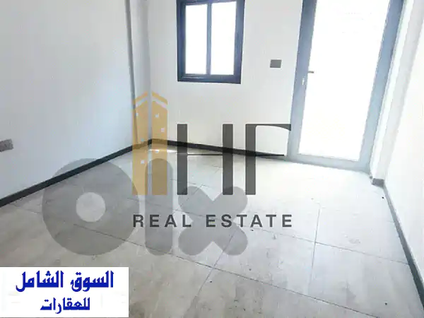 شقة للبيع في عين الرمانة | 155 م² مجددة بالكامل | موقع استراتيجي وطابق مرتفع