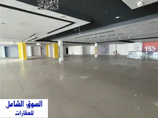 معرض تجاري فاخر للايجار بالصناعية 4 | واجهة استثنائية على الشارع الرئيسي | مساحات ضخمة لنجاحك