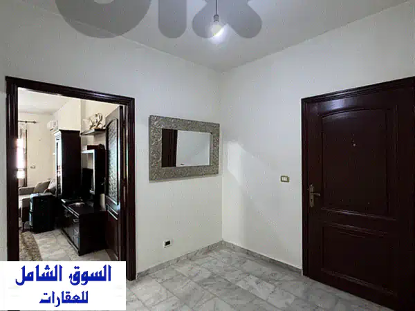 شقة مفروشة للبيع في بشامون: إطلالة بحرية ساحرة، نظام طاقة شمسية، جاهزة للسكن الفوري!