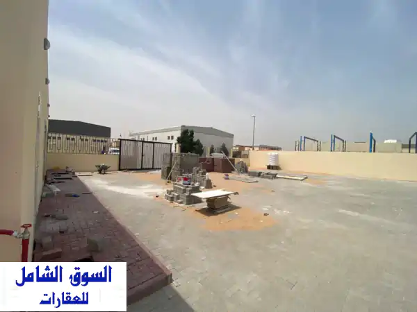 فرصة استثنائية! حوش صناعي ضخم للإيجار في الصجعة - الحنو، الشارقة (14530 قدم² جاهز ومجهز بالكامل)