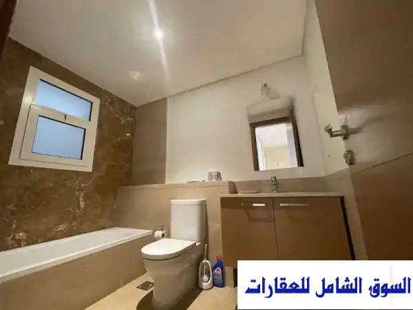 رفاهية وإقامة فندقية: شقة فاخرة للإيجار اليومي بميفيدا بوليفارد التجمع الخامس | مسبح وفيو ساحر