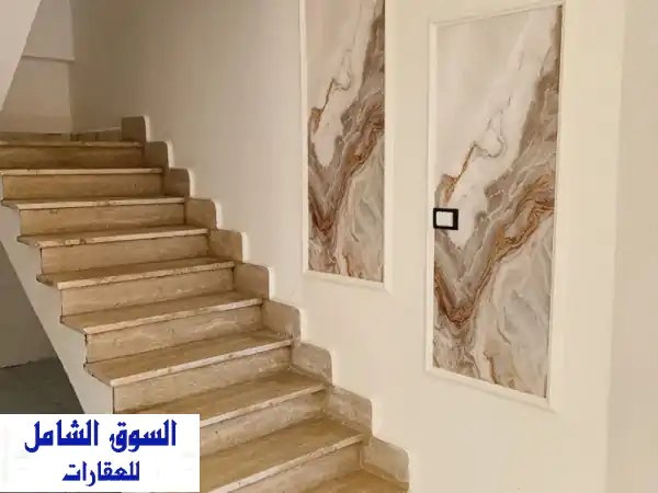 فيلا توين هاوس فاخرة للبيع بقرية حورس ك71 الساحل الشمالي | إطلالة مباشرة على حمام السباحة واستلام فوري!