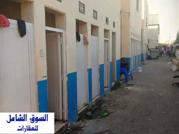 فرصة استثمارية ذهبية بالشارقة: سكن عمال ومستودعين للبيع بالصناعية 12 | دخل سنوي ثابت وموقع حيوي